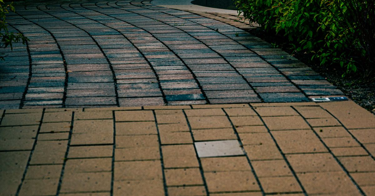 Managing Moisture Levels in Concrete Driveways Through the Seasons